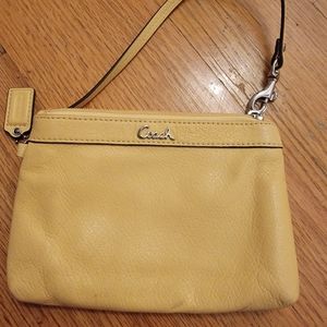 Coach small yellow leather clutch